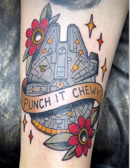 Millennium Falcon with a Punch It Chewy banner