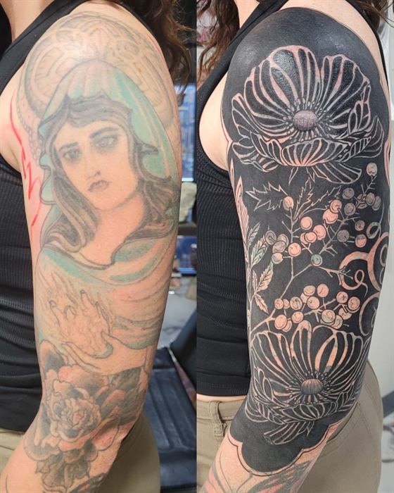 Woman's portrait with floral shoulder work in black and grey