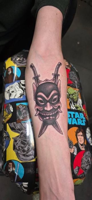 Demon mask forearm